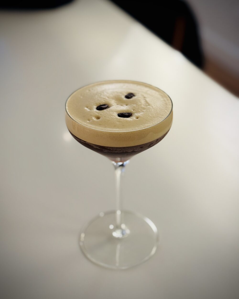 Espresso martini on a bright bar